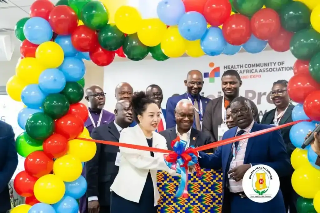 Delegates viewing medical technology exhibits at a health industry expo in Accra, Ghana