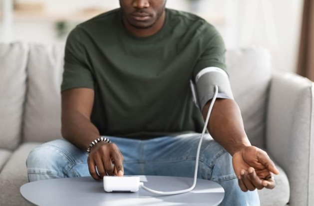 heart disease caused 17.8 percent - doctor checking blood pressure