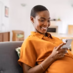 Can AI on a Phone Cut Maternal Deaths? Inside Nigeria’s $25M Bet ai cut maternal deaths - clinic health worker assisting patient