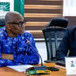 NCDC Director-General Jide Idris discussing support for Ebola contacts in quarantine