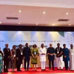 Panel of experts discussing scaling proven health innovations at a conference in Abuja